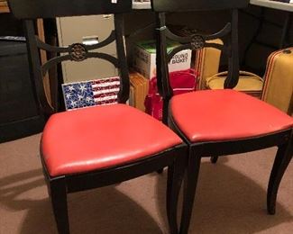 Pair of leather seated chairs.