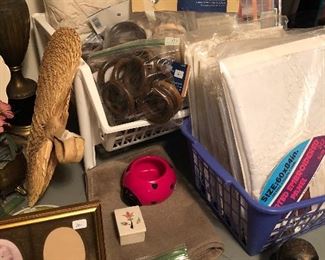 Curtains and valences, lots of drapery hooks.