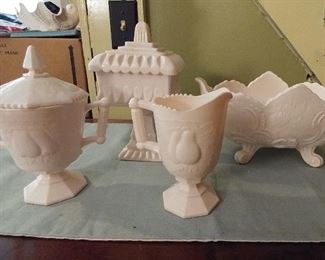 Several pieces of Jeannette Pink Milk Glass