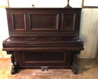 antique upright piano