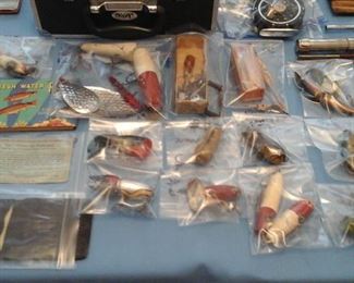 Vintage fishing lures,  Liar's License for fishing, fresh water fish guide book,  Morse code for flash light on lake.