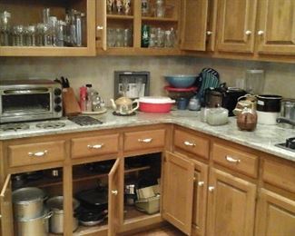 toaster oven, vintage pyrex, pots and pans, baking pans and lots of kitchen stuff