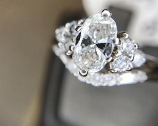 Oval diamond center.75ct with wedding band