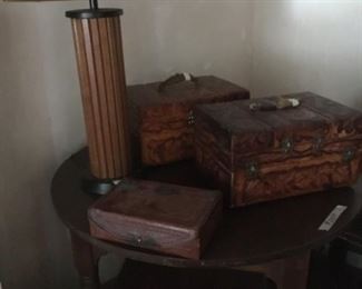 Leather jewelry boxes, lamp and round table