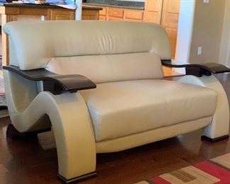 Contemporary Hardware Leather Loveseat/Sofa	32x58x37in	HxWxD
