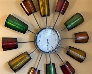 Contemporary Sun Wall Clock	37in diameter	