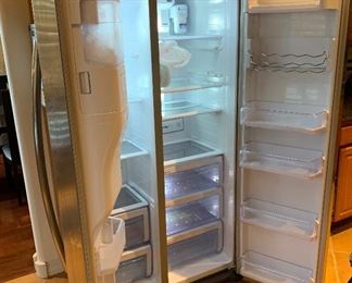 Samsung 24.1 cu ft Side-By-Side Refrigerator RSG257AARS	70x36x29in	HxWxD