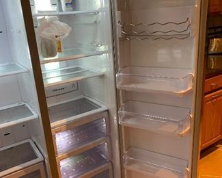 Samsung 24.1 cu ft Side-By-Side Refrigerator RSG257AARS	70x36x29in	HxWxD