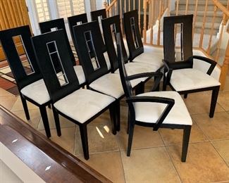 Contemporary Dark Wood & Steel Dining room Table w/ 10 Chairs	30x44x86-124in	HxWxD
