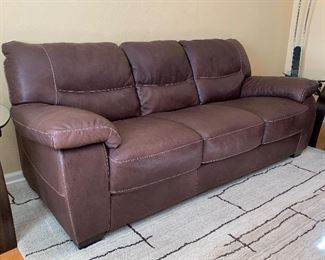 Natuzzi Editions Italian Leather Sofa/Couch	34x84x38in	HxWxD
