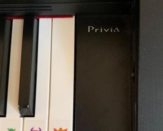 Casio Privia PX-870 Digital Console Piano	31x54.5x12i	HxWxD
