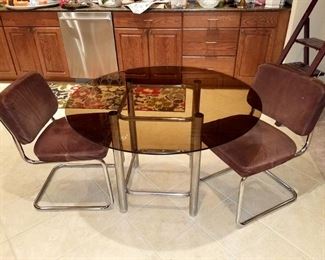 Smoked glass kitchen table and 3 chairs (one not shown)