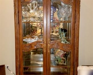 Pair of lighted china/curio cabinets that match a dining room table set