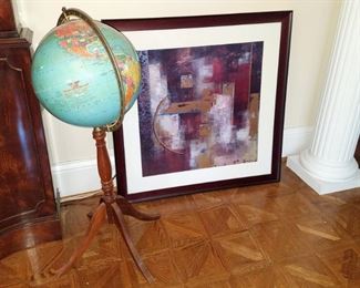 Globe on stand. Framed art