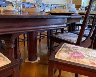 Mahogany dining table with EIGHT leaves, plus 12 mahogany side chairs