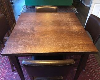 2 pull out leaves. Leaves are 12” each. Table is 36 1/2” square with leaves tucked under. 35 3/4” tall.