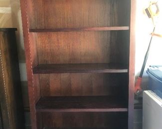 Measures 49” across x 19” deep and 79 1/4” tall.