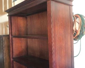 Measures 49” across x 19” deep and 79 1/4” tall.