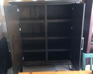 Measures 51 3/4” across x 19” deep and 60 3/4” tall.