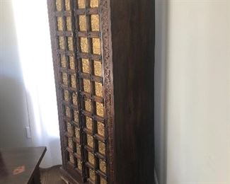 Measures 34 1/2” across x 16” deep and 70” tall.