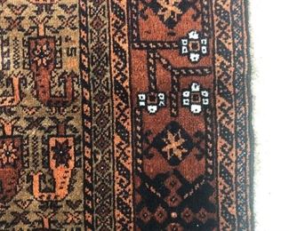 Rug measures 55” x 30.5”.