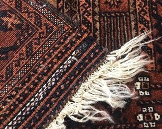 Rug measures 55” x 30.5”.