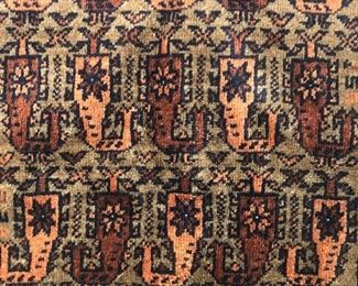 Rug measures 55” x 30.5”.