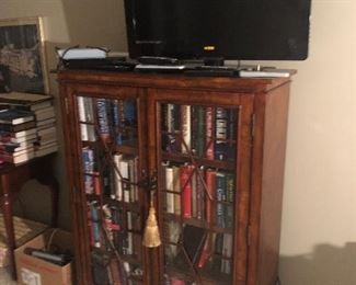 Bookcase sold. TV available Sunday 