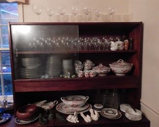Mid Century dining room side board with hutch. Lots of china and glass ware. Formal china from Russia, China, as well as Herend from Hungary.