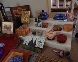 Lots of small boxes, Russian art and plaques.