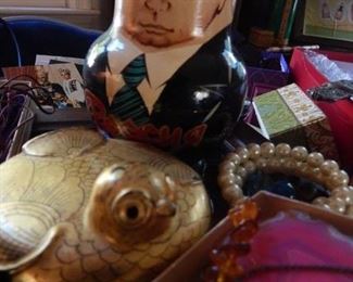 Costume jewelry, Putin doll, boxes and more.