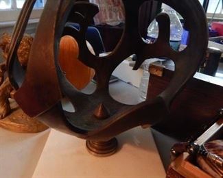 Bronze art piece. Mid century sphere.