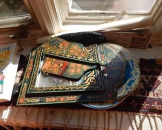 Painting on wood plaques.
