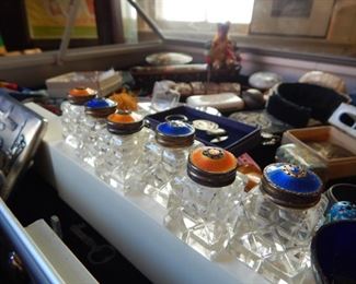 Modern crystal and enamel salt and peppers.