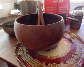 Mid century modern salad bowl with serving spoons.
