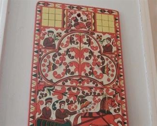 Hand painted on wood wall plaque.