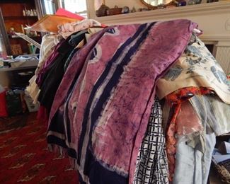 Lots of fabric and women's clothing.
