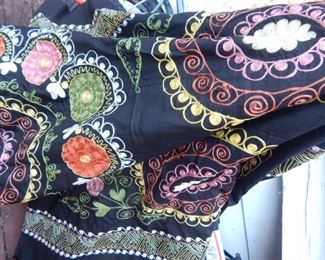 Asian bed coverlets, embroidered.