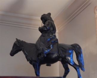 Old antique bronze statue, signed and dated.