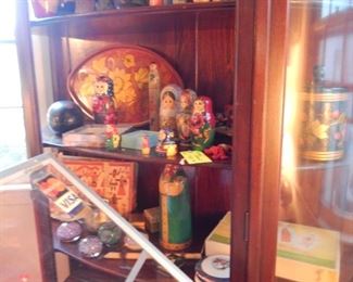 Russian stack dolls, hand painted trays, paper weights, limoges box, Russian hand painted lacqured boxes and more.