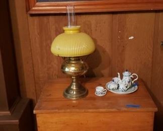 Antique sugar chest, lamp, and dollhouse teaset