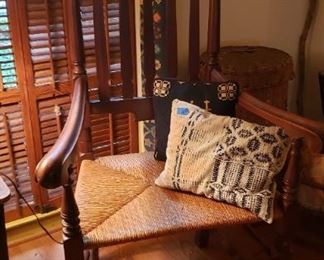 Ornate slat back chair with rush seat