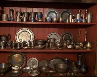 Pewter plates, cups. Goblets, bowls, tankards, salt and peppet shakers. Candlesticks, and morr