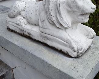 One of a pair of concrete lions