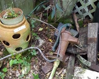 Clay pots and water hand pump