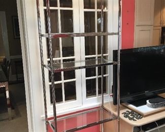 Hollywood Regency/ MCM Chrome and brass etagere with 5 glass shelves, 80" tall, 30" wide and 14" Deep