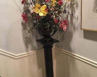 Flower arrangement on Marble pedestal