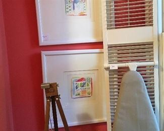 Artist easel, two framed prints