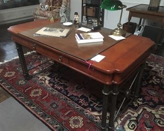 Faux leather top and iron desk on Heriz made in Indai rug