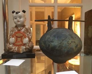 Gumps' child on stand, Reiku pottery signd artist unidentified